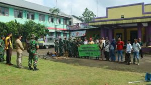 TNI SATNONKOWIL Semester 2 Bersama Pemdes Dangdang Cisauk Tangerang Mengadakan Karya Bakti